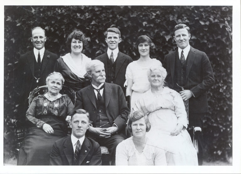 Gates surrounded by HIS family REsource