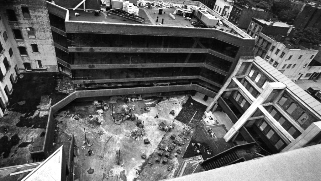 Black and white photo of a construction site in Bedford-Stuyvesant in Brooklyn, New York.