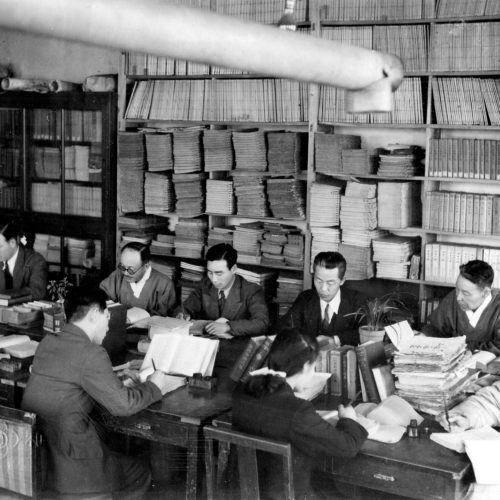 "Action shot of the Dictionary staff. Korean Language Research Society, Seoul, Korea." - caption on the back of the photograph