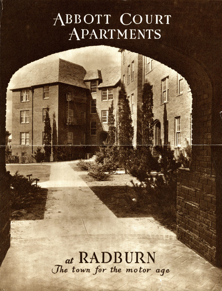 Advertisement for Abbot Court Apartments in Radburn. Advertisement reads "Abbott Court Apartments at Radburn, "The Town for the Motor Age". Image features an underpass and walkway to a large apartment with shrubs lining the building and walkway.
