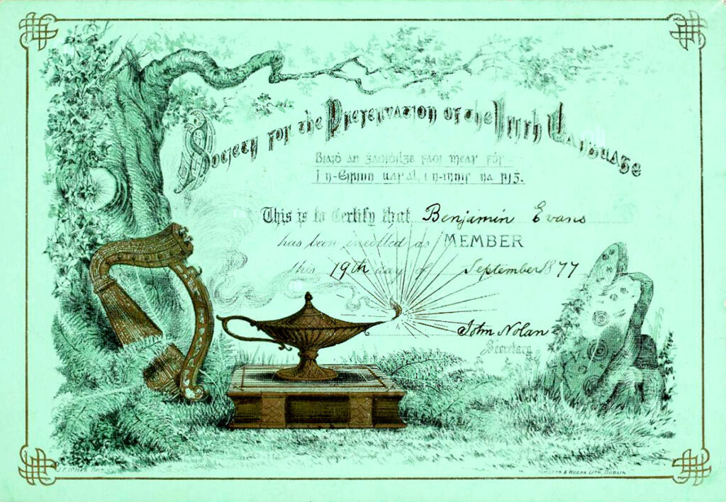 Green colored certificate from Society for the Irish Language. Text is surrounded by an outside border reading "Society for the Preservation of the Irish Language" with the awardees name, Benjamin Evans, awarded on September 19th, 1877.